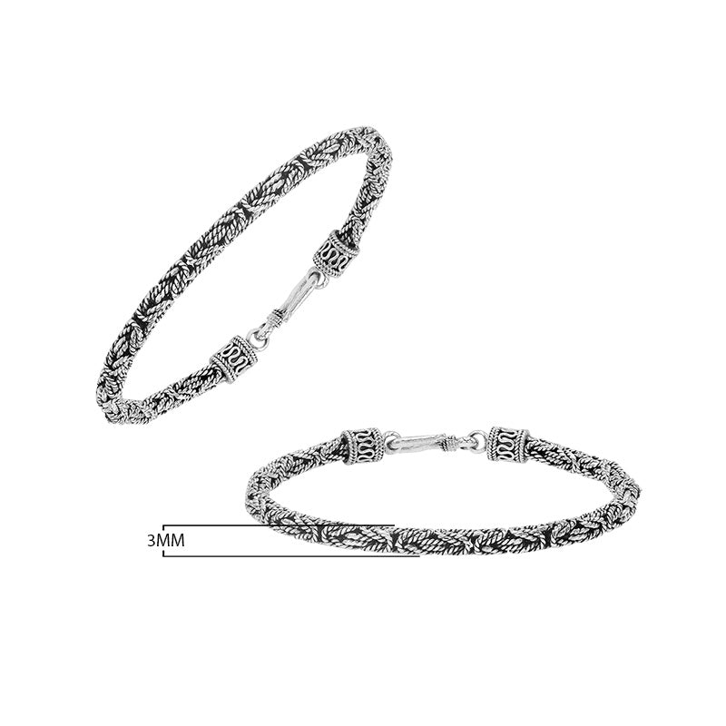 Sterling silver braided wheat chain bracelet with oxidized finish and ornate hook clasp handcrafted in Bali.