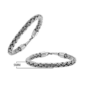 Sterling silver thick braided wheat chain bracelet with oxidized finish and hook clasp handcrafted in Bali.