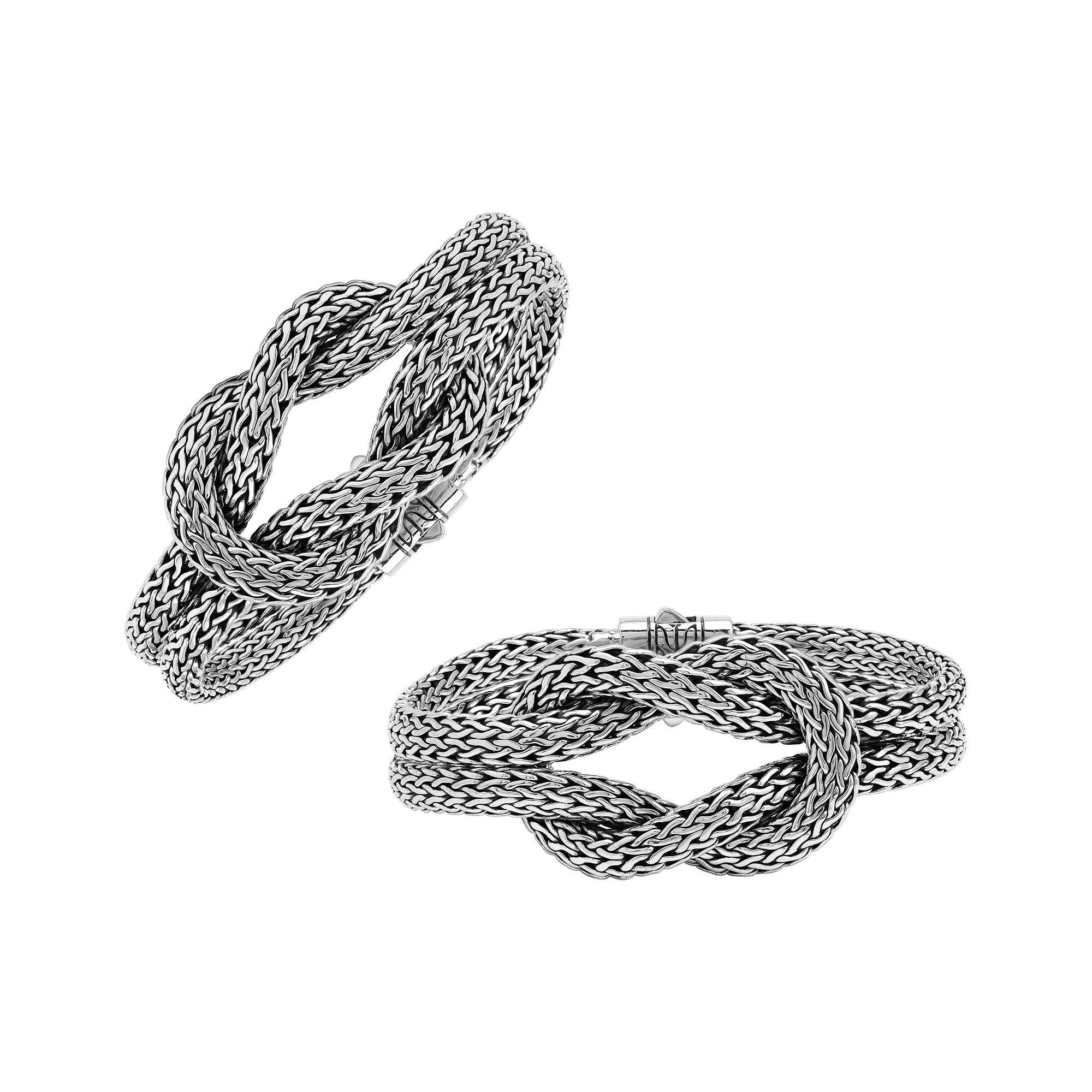 Wholesale sterling silver multi-strand woven knot bangle featuring a thick Balinese-style chain weave and a secure push clasp for premium artisan jewelry displays.