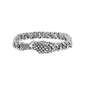 Wholesale sterling silver dragon-scale textured bangle featuring a woven chain structure and secure hook lock, crafted with bold Balinese artisan detailing for premium collections.
