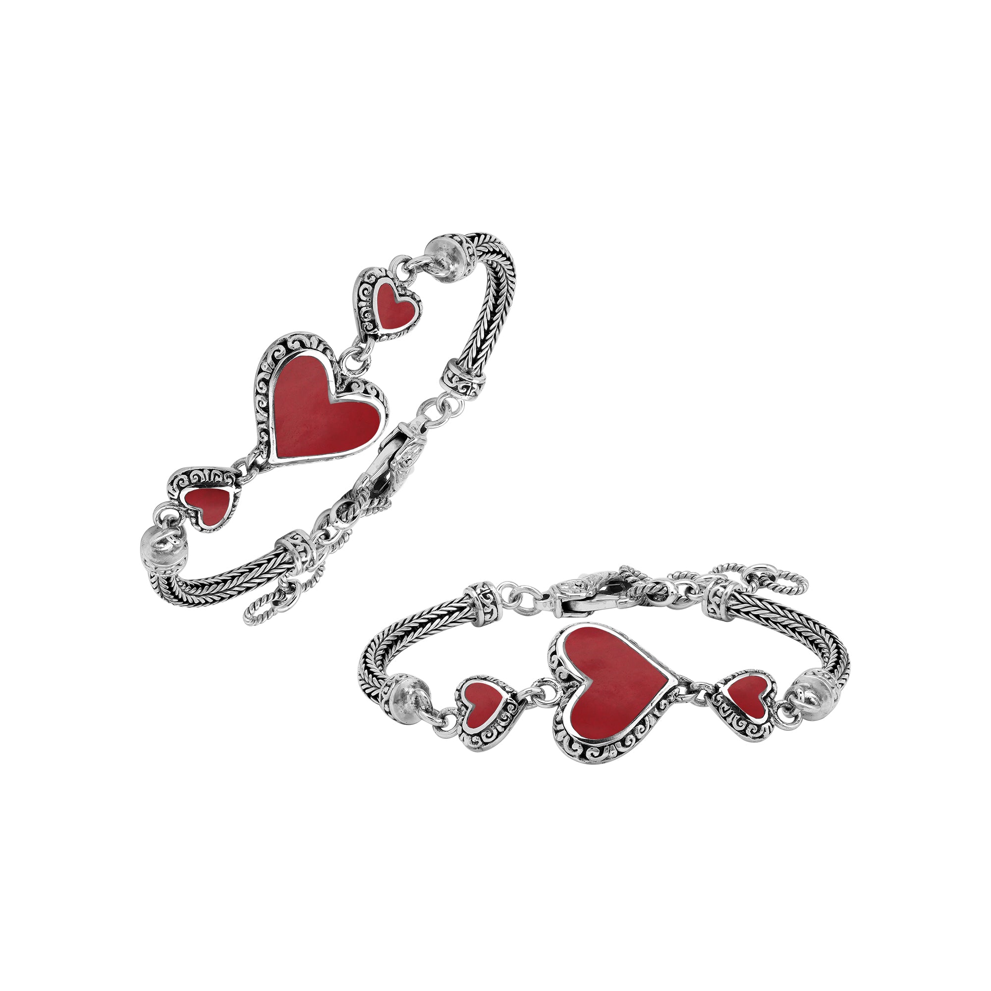 Wholesale sterling silver bracelet featuring Red Coral heart motifs, decorative Balinese detailing, and a secure lobster lock designed for premium artisan-inspired jewelry collections.