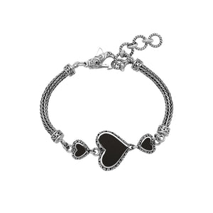 Wholesale sterling silver bracelet featuring Black Shell heart motifs, detailed Balinese ornamental scrollwork, and a secure lobster lock designed for artisan-inspired premium jewelry collections.