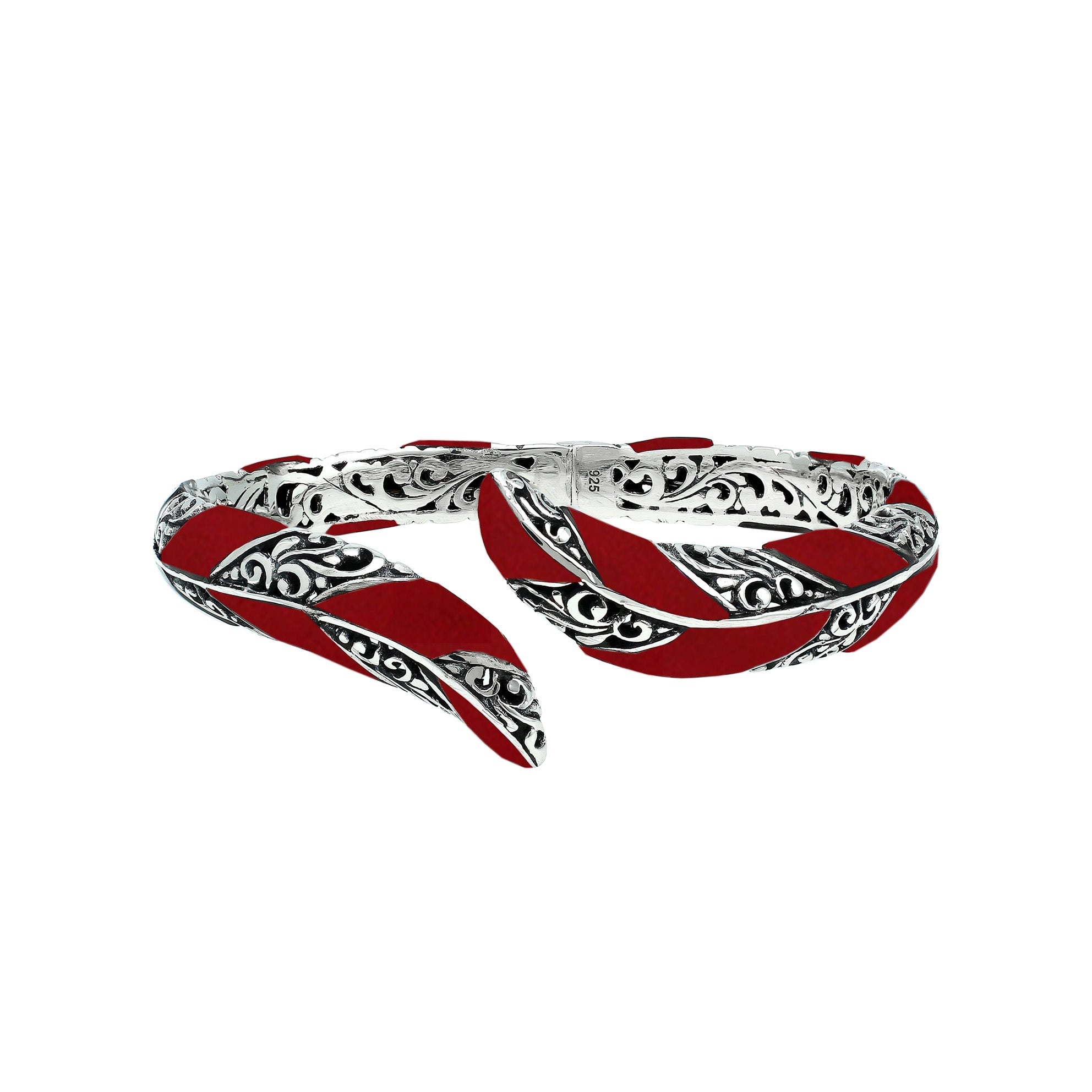 Wholesale sterling silver feather-inspired bangle featuring bold Red Coral inlays, ornate Balinese scroll engravings, and a secure hinge lock for premium artisan-style jewelry assortments.