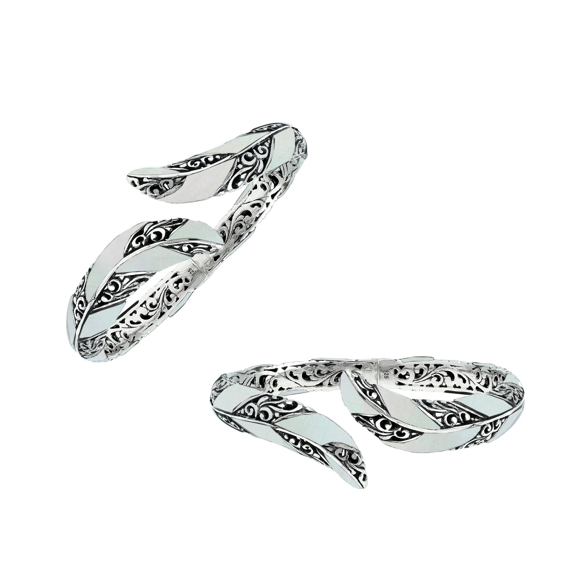 Wholesale sterling silver feather-inspired bangle featuring Mother Of Pearl inlays, ornate Balinese scroll engraving, and a secure hinge lock for premium artisan-style jewelry assortments.