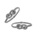 Wholesale sterling silver woven knot bracelet featuring detailed chainwork, oxidized highlights, and a secure push clasp, ideal for premium handcrafted jewelry assortments and boutique suppliers.