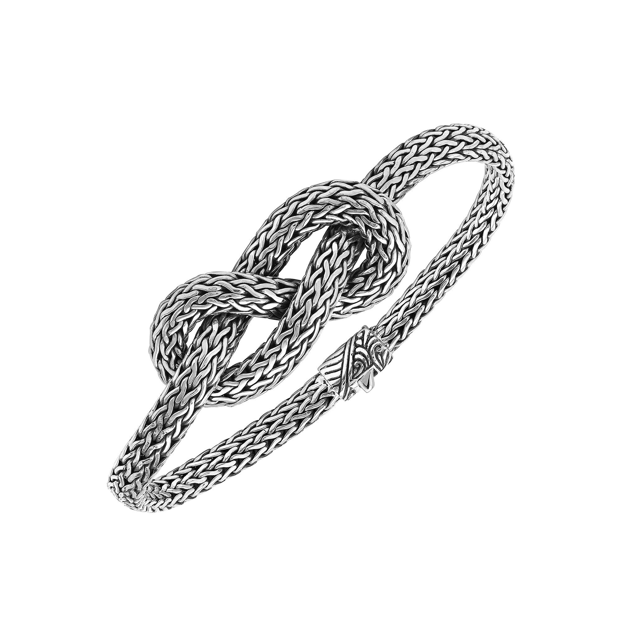Wholesale sterling silver woven knot bracelet featuring detailed chainwork, oxidized highlights, and a secure push clasp, ideal for premium handcrafted jewelry assortments and boutique suppliers.