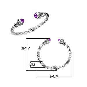 Wholesale sterling silver twisted cable cuff bracelet featuring faceted amethyst quartz end caps, 4MM band size, hinge lock, and detailed Bali-style engravings.