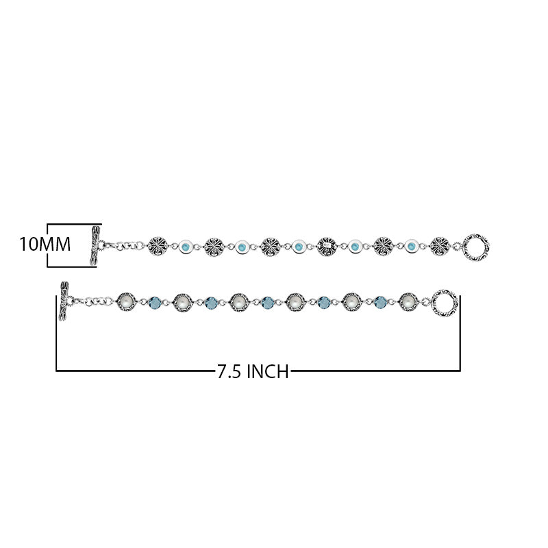 Wholesale sterling silver bracelet featuring alternating Mabe pearl and Blue Topaz quartz round links with oxidized detailing and a secure toggle lock design.