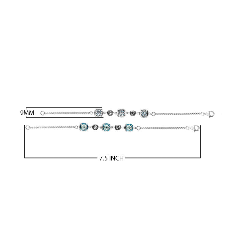 Wholesale sterling silver bracelet with blue topaz quartz stones and alternating Bali filigree links.