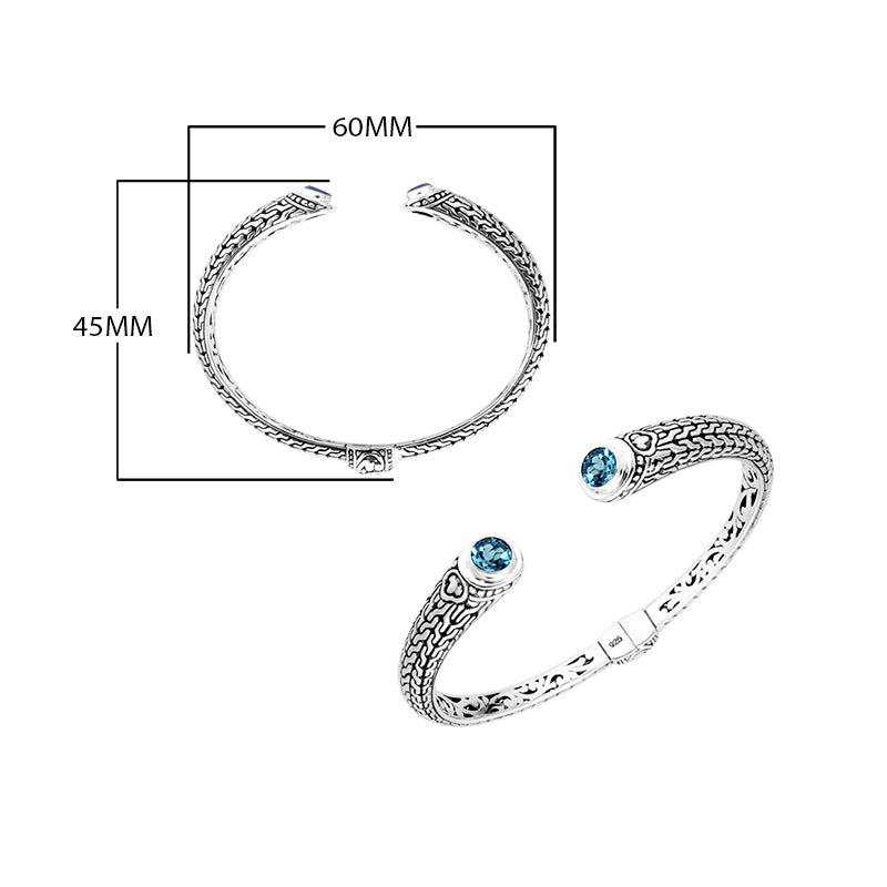 Wholesale sterling silver Bali engraved hinge cuff bracelet featuring bright blue topaz quartz accents with polished–oxidized artistry, crafted for premium wholesale jewelry inventory needs.
