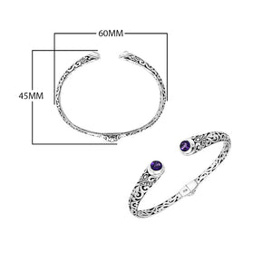 Wholesale sterling silver Bali engraved hinge cuff bracelet featuring vivid amethyst quartz accents with polished–oxidized detailing, crafted to suit premium artistic wholesale jewelry programs and curated bulk assortments.