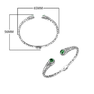 Wholesale sterling silver Bali engraved hinge cuff bracelet featuring radiant green quartz ends with polished–oxidized detailing, designed to enhance premium, modern, and artisan-focused wholesale jewelry lines.