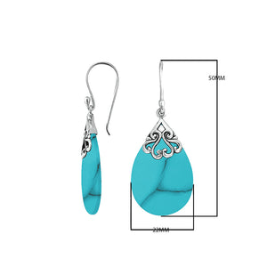 Sterling silver turquoise shell teardrop earrings with scroll accent design for wholesale jewelry buyers