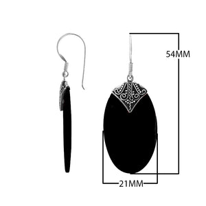 Black Shell oval silver earrings with scroll design