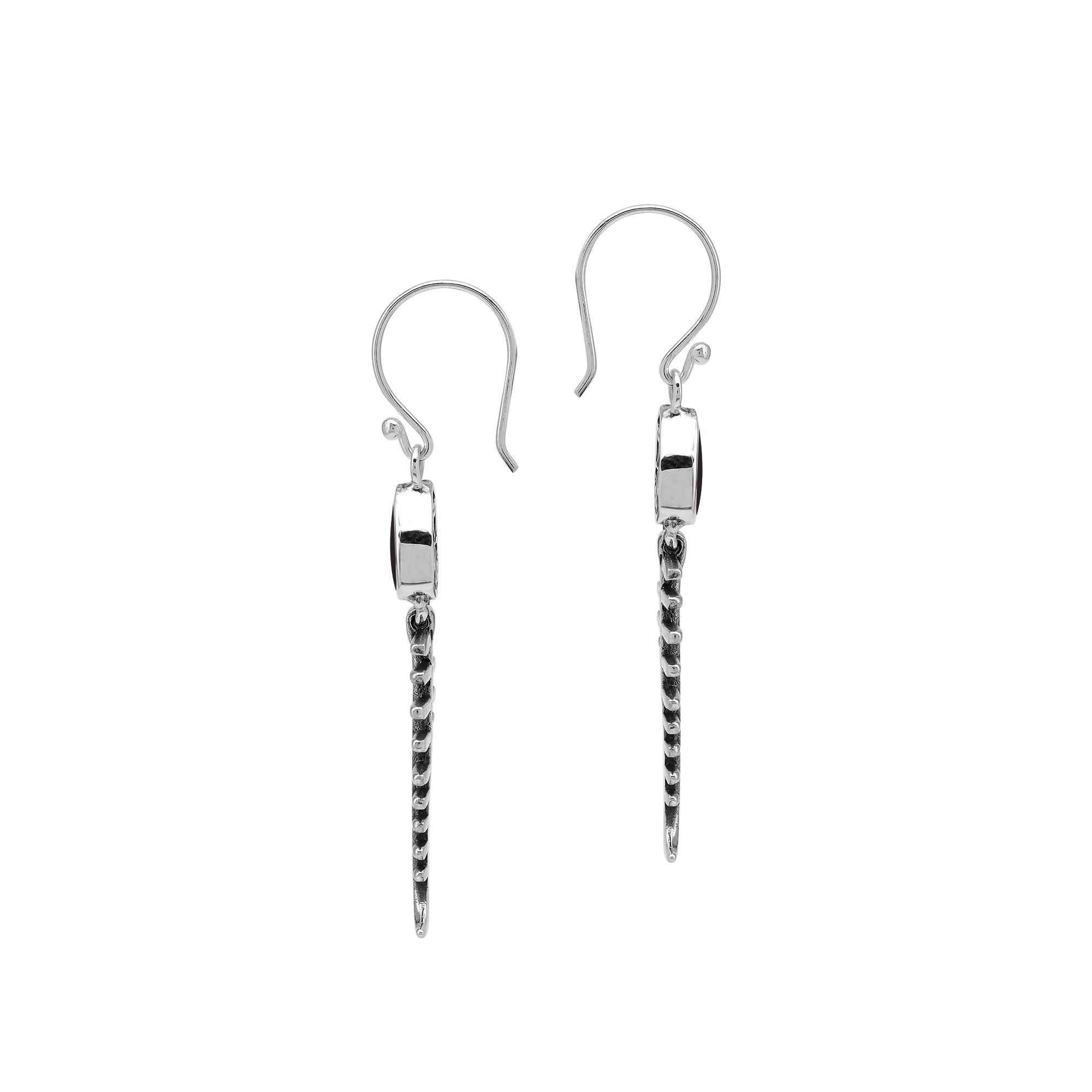 Black Shell silver fishbone earrings with artistic design