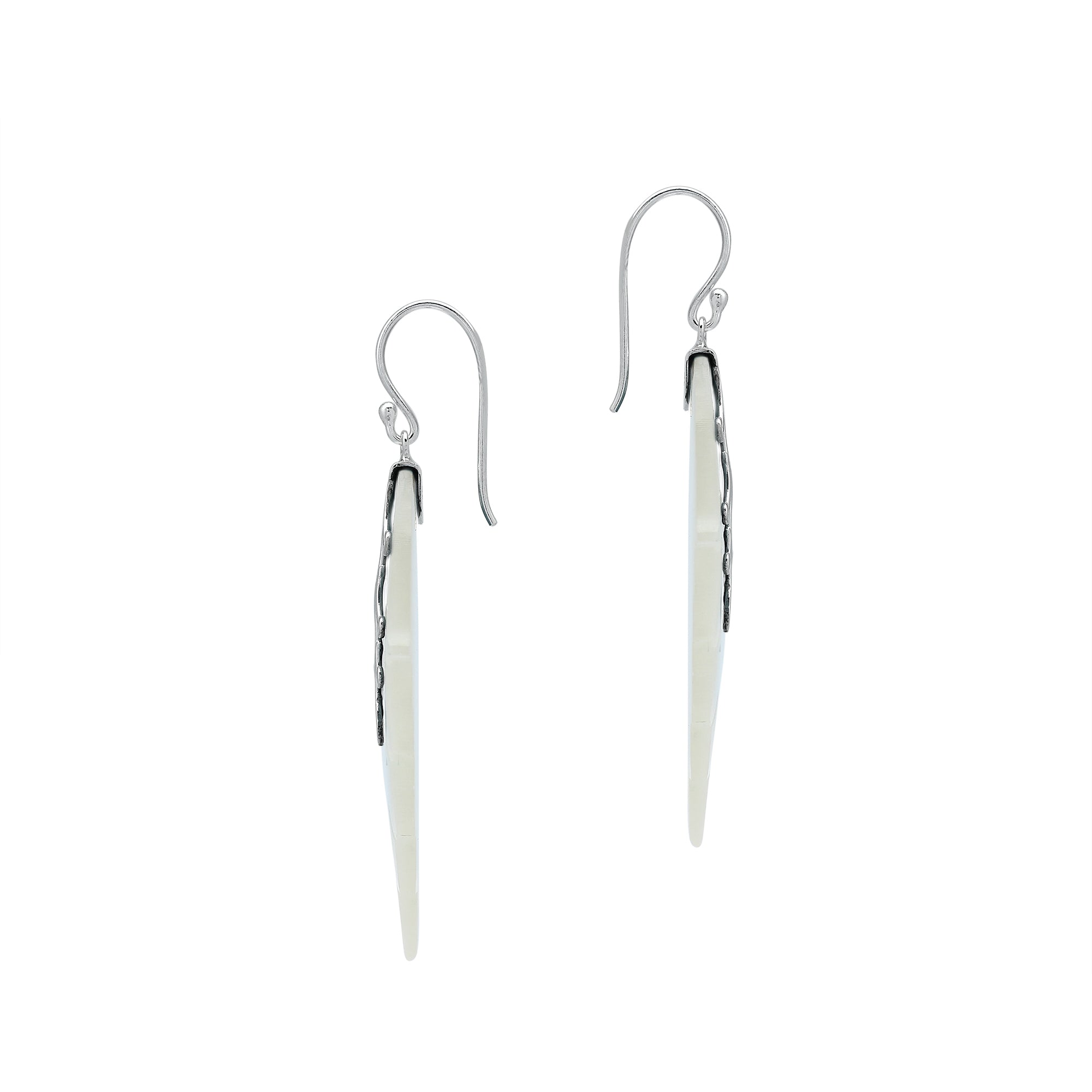 Sterling silver mother of pearl carved leaf drop earrings with polished silver detailing and handcrafted shell design.