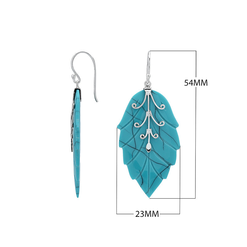Sterling silver turquoise shell carved leaf drop earrings with polished silver detailing and handcrafted stone design.