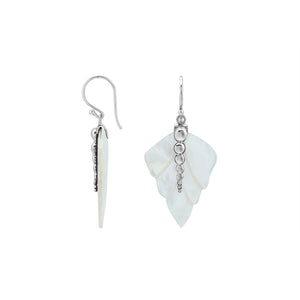 Sterling silver mother of pearl carved leaf drop earrings with polished silver bead detailing and handcrafted shell design.