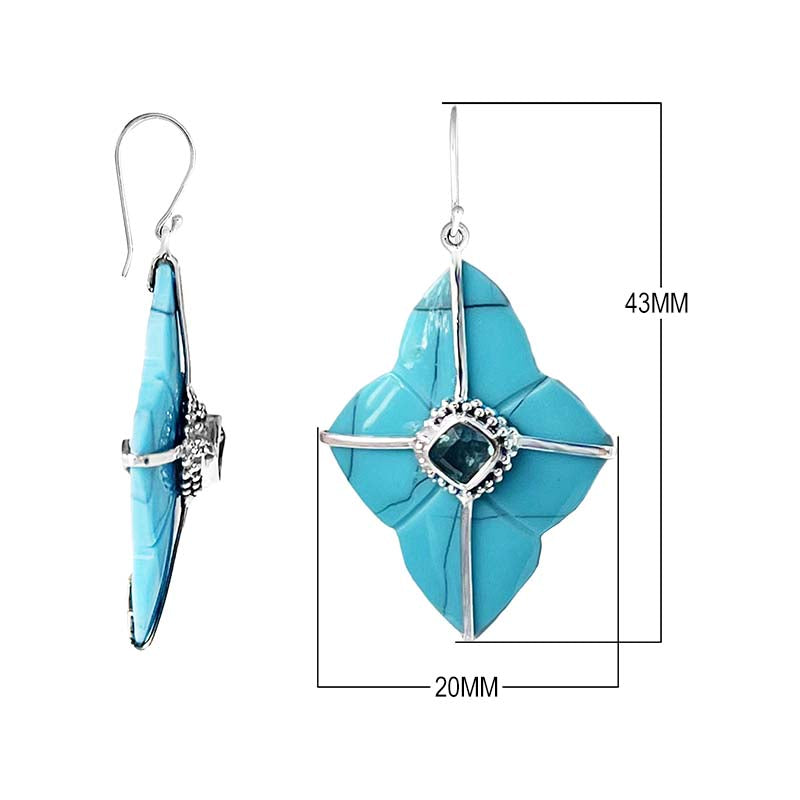 Sterling silver Turquoise Shell and Blue Topaz Quartz dangle earrings with geometric blue inlay panels, faceted centers, and radiating silver framework