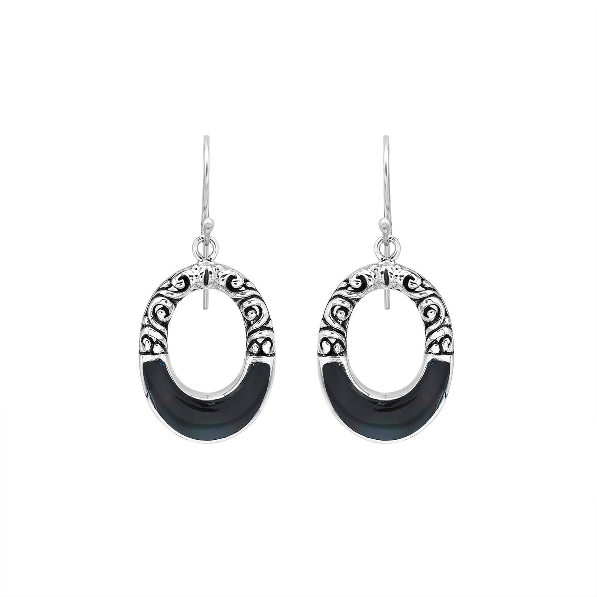 Sterling silver oval drop earrings featuring glossy Black Shell inlay, open center silhouette, sculpted scroll motifs, oxidized detailing, polished borders, and French ear wires.