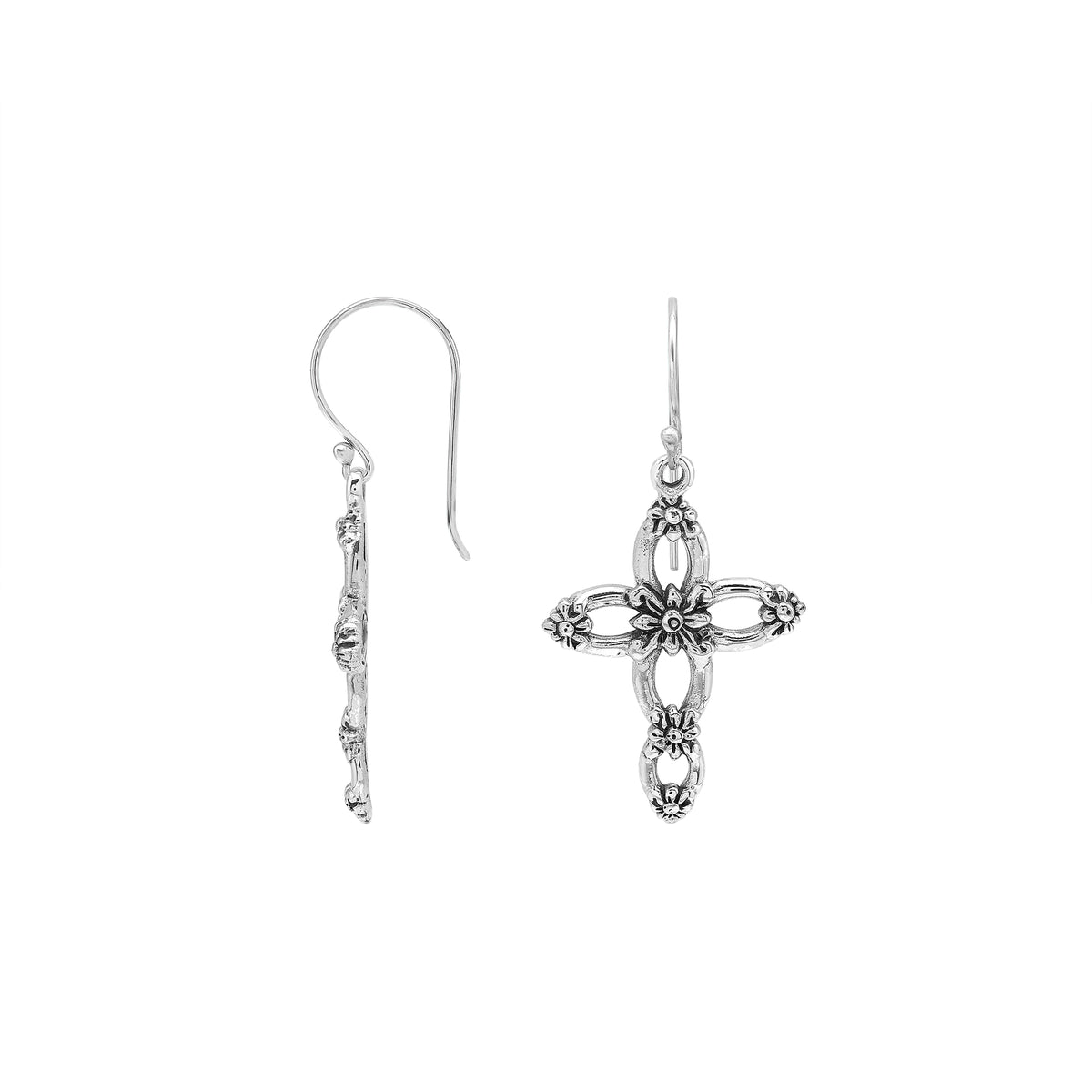 Sterling silver cross drop earrings featuring open oval sections, sculpted floral motifs, oxidized detailing, polished raised accents, and classic French ear wires.