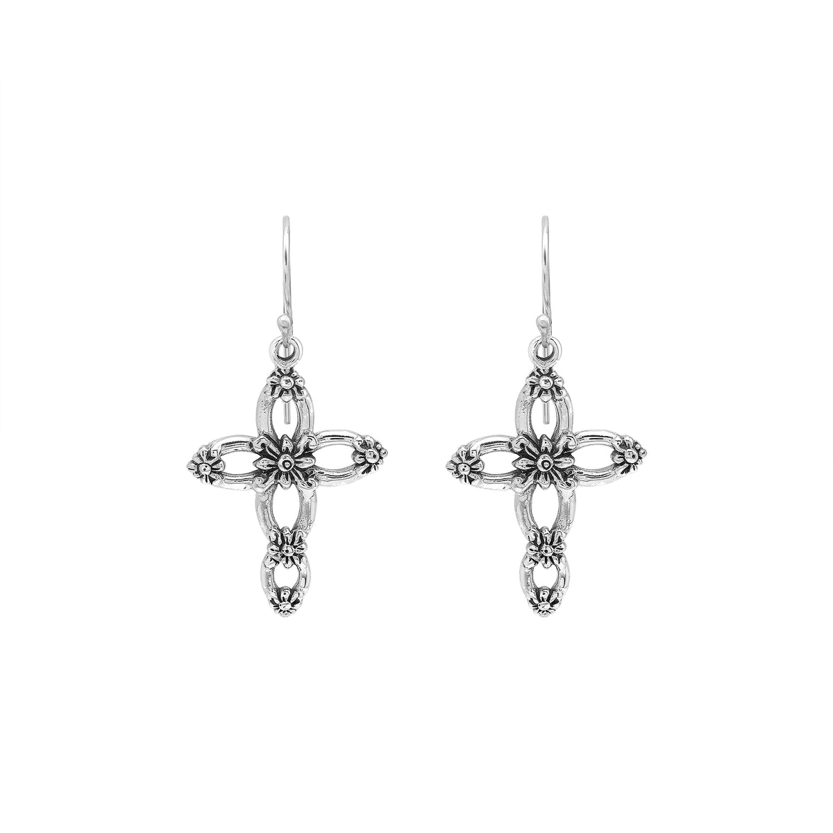 Sterling silver cross drop earrings featuring open oval sections, sculpted floral motifs, oxidized detailing, polished raised accents, and classic French ear wires.