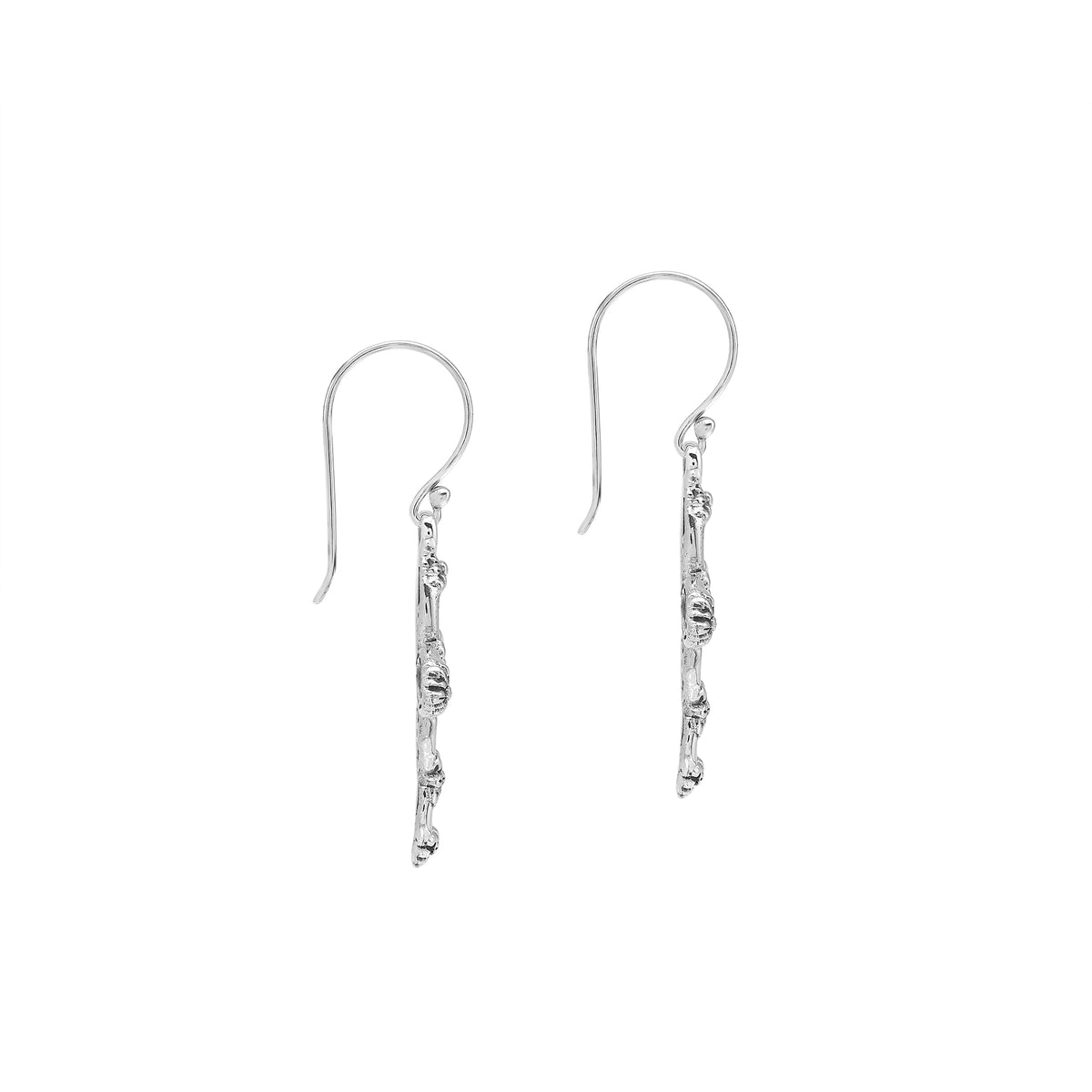 Sterling silver cross drop earrings featuring open oval sections, sculpted floral motifs, oxidized detailing, polished raised accents, and classic French ear wires.