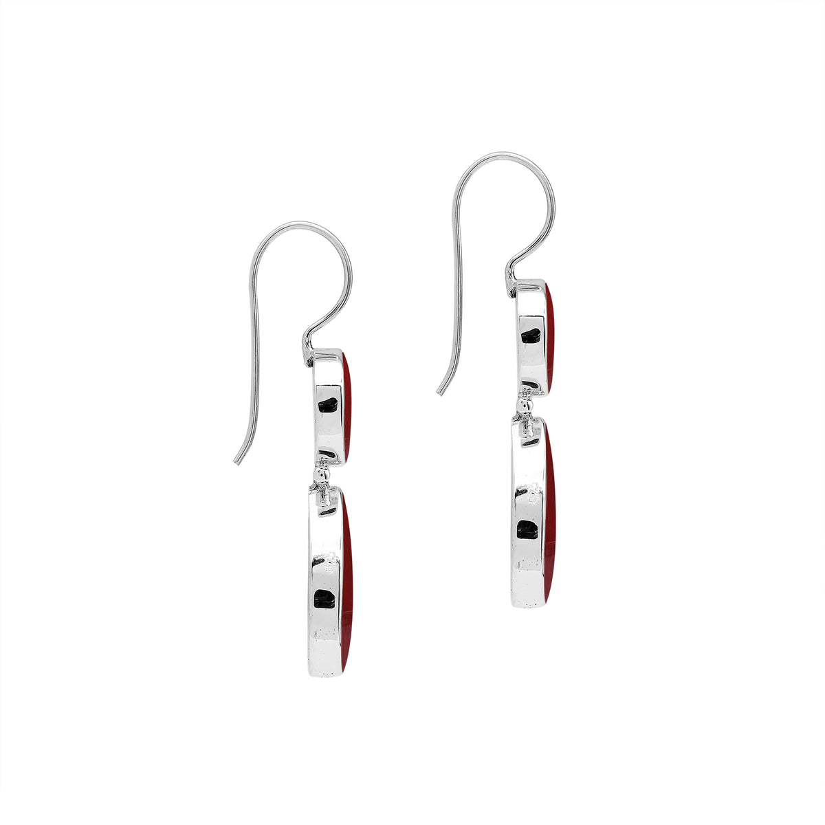 Sterling silver Red Coral dangle earrings featuring a round upper element and teardrop lower drop, polished bezel settings, articulated construction, and elongated ear wires.