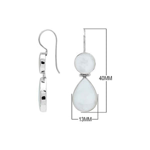 Sterling silver Mother Of Pearl dangle earrings featuring round and teardrop shell elements, polished bezel settings, articulated construction, and elegant elongated ear wires.
