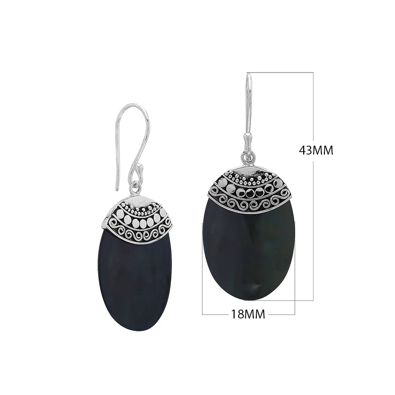 Wholesale sterling silver earrings featuring Black Shell ovals with an ornate patterned silver cap.