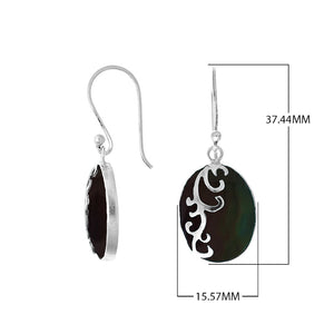 Wholesale sterling silver earrings featuring oval black shell drops with polished wave-motif overlay, crafted to deliver consistent artisan quality and elegant catalog-ready visual appeal for bulk jewelry buyers.