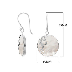 Wholesale sterling silver earrings featuring round mother of pearl drops with a polished wave-motif overlay, offering consistent artisan craftsmanship and refined catalog-ready presentation for bulk jewelry buyers.