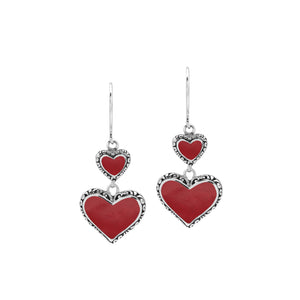 Wholesale sterling silver earrings featuring double red coral heart drops with ornate borders, crafted to deliver consistent artisan quality and strong catalog-ready appeal for bulk jewelry purchasers.