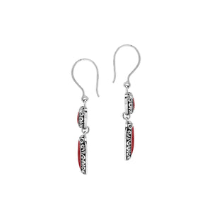 Wholesale sterling silver earrings featuring double red coral heart drops with ornate borders, crafted to deliver consistent artisan quality and strong catalog-ready appeal for bulk jewelry purchasers.