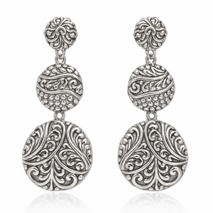 Sterling silver triple drop earrings with polished oval design and artisan detailing