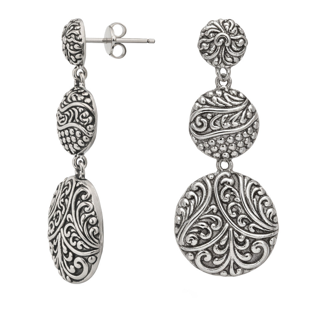 Sterling silver triple drop earrings with polished oval design and artisan detailing