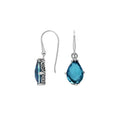 Wholesale Sterling Silver London Blue Topaz Quartz Teardrop Earrings With Detailed Balinese-Style Metalwork.