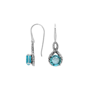Wholesale Sterling Silver Blue Topaz Quartz Round Infinity Earrings With Detailed Balinese-Style Metalwork.