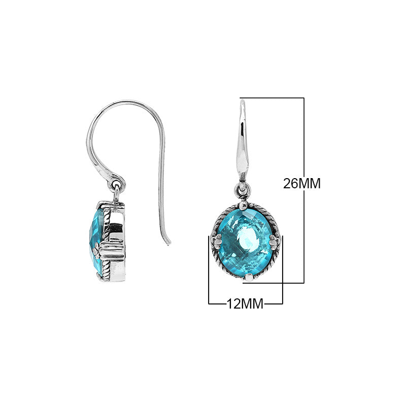 Wholesale Sterling Silver Blue Topaz Quartz Oval Rope-Frame Earrings With Detailed Balinese-Style Metalwork.