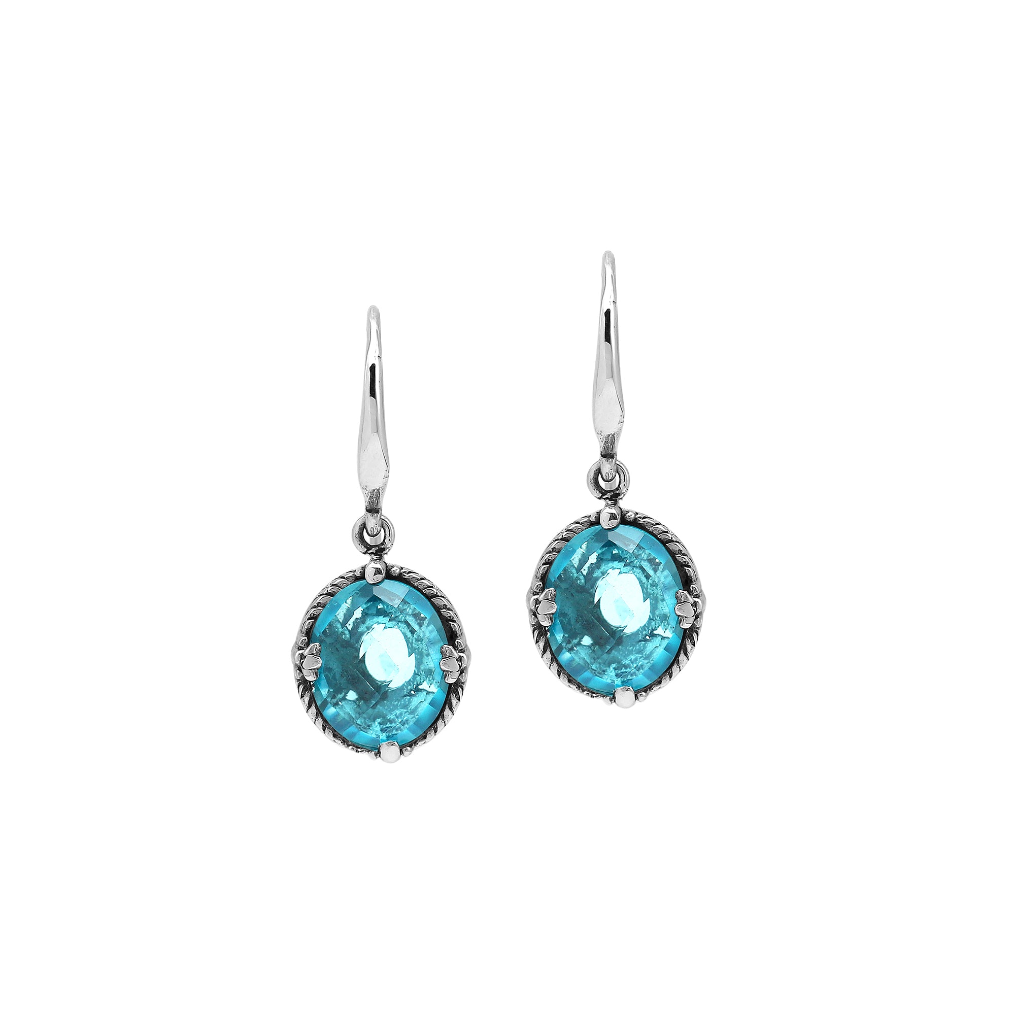 Wholesale Sterling Silver Blue Topaz Quartz Oval Rope-Frame Earrings With Detailed Balinese-Style Metalwork.