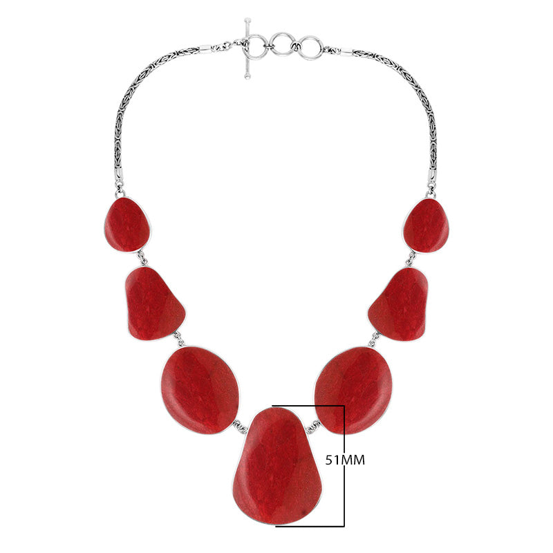 Wholesale sterling silver teardrop coral necklace with Balinese handcrafted design.