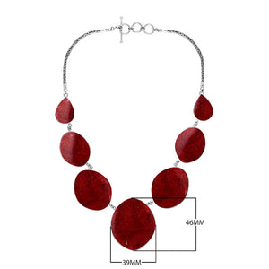 Wholesale sterling silver oval coral necklace with Balinese handcrafted design.