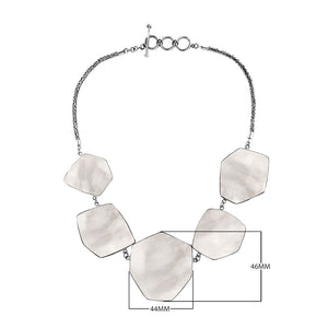 Sterling silver necklace with hexagon-shaped mother of pearl links, polished artisan finish.