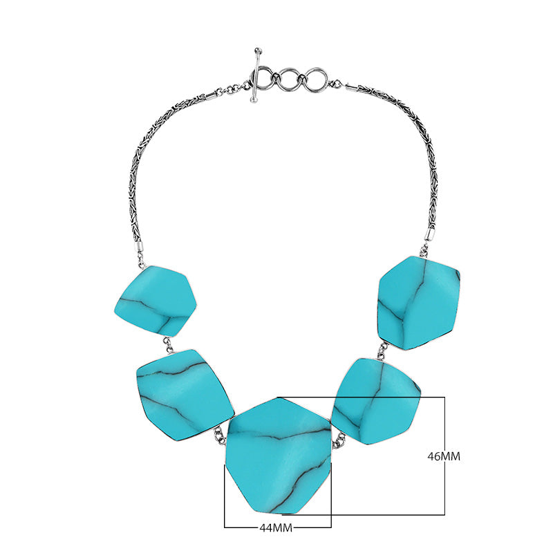 Sterling silver necklace with hexagon turquoise shell links, polished artisan finish.
