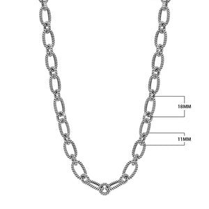 Sterling silver textured rope link chain necklace with toggle clasp.