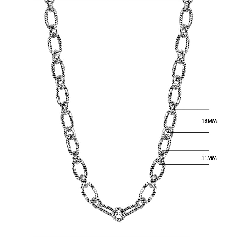 Sterling silver textured rope link chain necklace with toggle clasp.