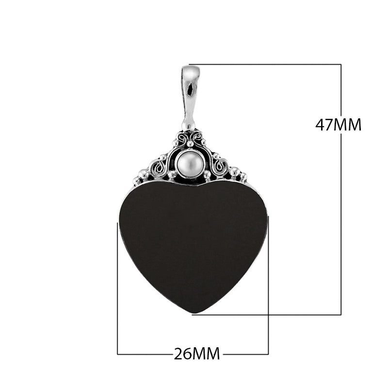 Sterling silver heart pendant with black shell and round Mother of Pearl accent, handcrafted Bali jewelry available for wholesale purchase.