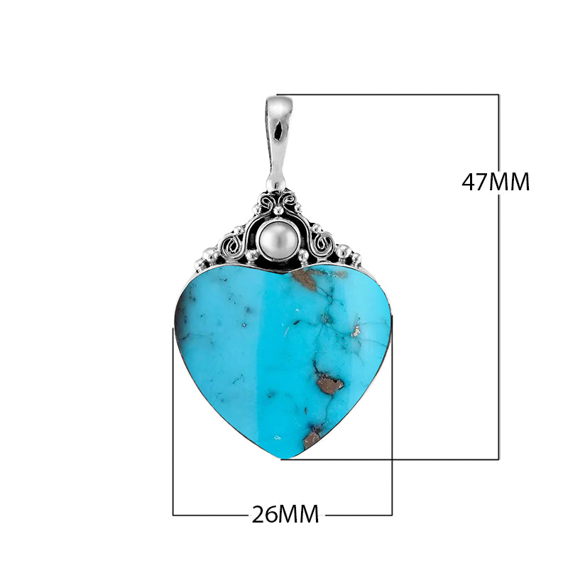 Sterling silver heart pendant with turquoise gemstone and round Mother of Pearl accent, handcrafted Bali jewelry available for wholesale purchase.