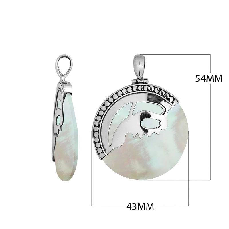 Sterling silver round pendant with luminous Mother of Pearl inlay and artistic silver overlay design, handcrafted Bali jewelry available for wholesale purchase.