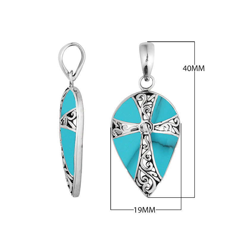 Wholesale sterling silver teardrop pendant with turquoise shell inlay and ornate cross design, handcrafted in Bali – artisan bulk jewelry for boutiques and resellers.